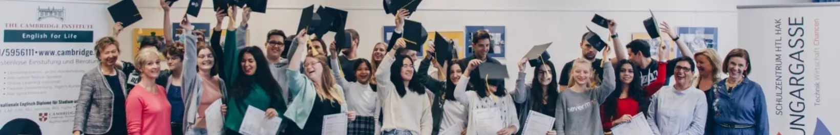 School students throwing Mortar Cambridge Certificate